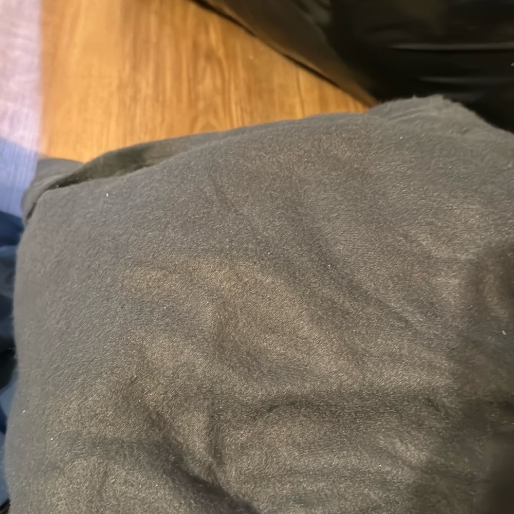 Gray blanket with arms
